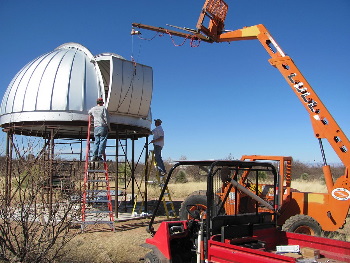 Lifting the 200lb lower shutter into place. 6-2010